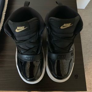 Black and gold patent leather Jordan legacy 312